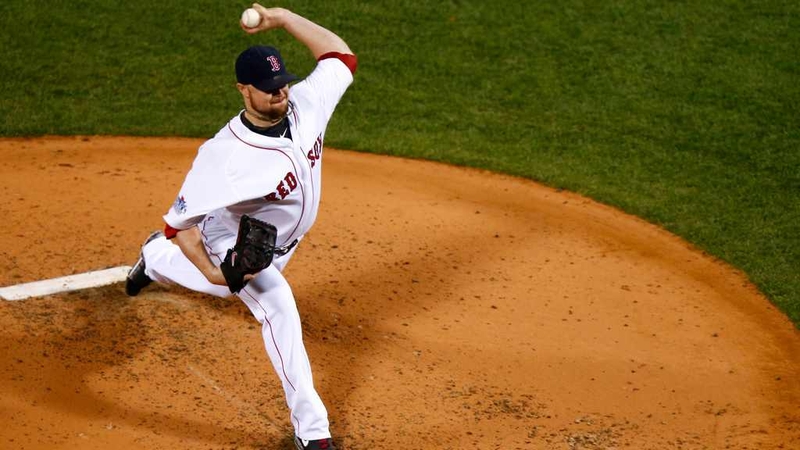 Jon Lester pitches against the St Louis Cardinals