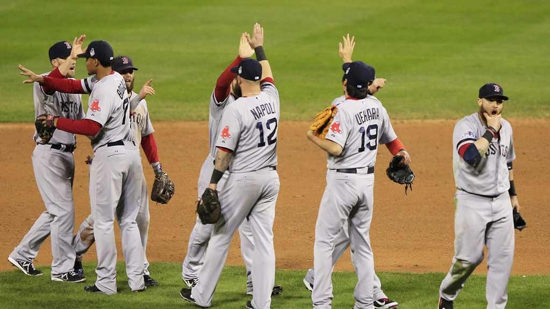 The Boston Red Sox celebrate as the series goes to 2-2