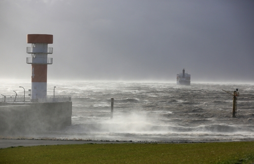 Waves crash in on the coast of Germany