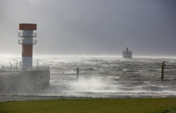 Waves crash in on the coast of Germany