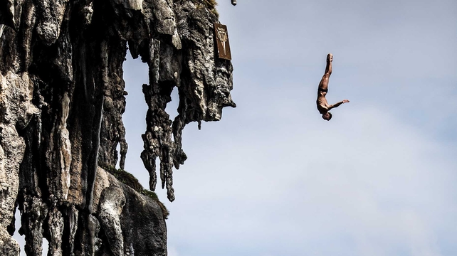 Artem Silchenko dives at Viking Caves at the Cliff Diving World Series at Phi Phi Island, Thailand