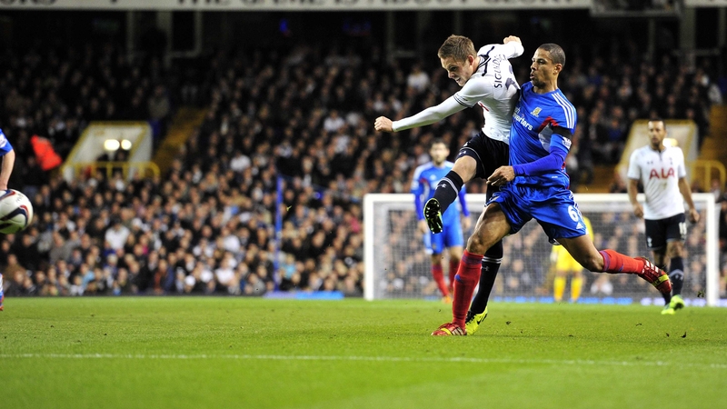 Tottenham Hotspur's Icelandic midfielder Gylfi Sigurdsson scores the opening goal