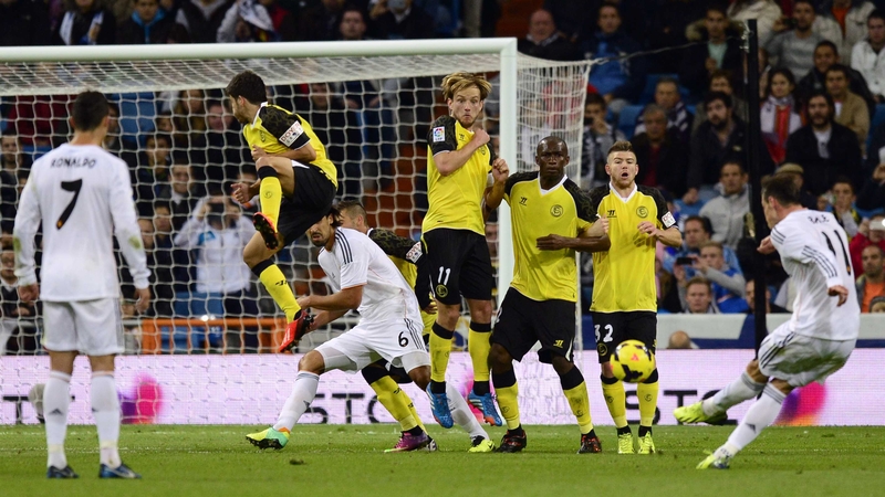 Gareth Bale scores from a freekick