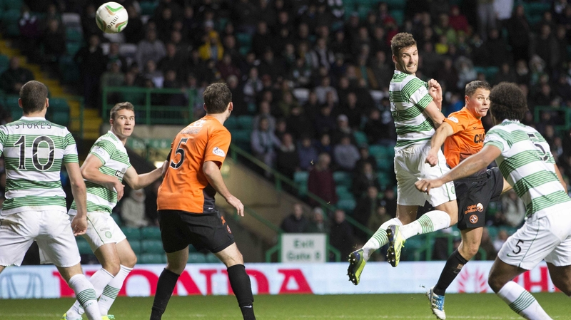 Celtic's Charlie Mulgrew scores to secure a draw against Dundee United