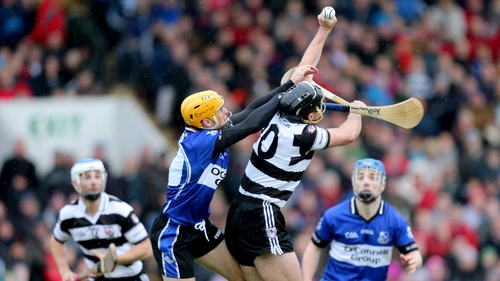 Sarsfields’ Eanna Martin and Padraig O’Shea of Midleton