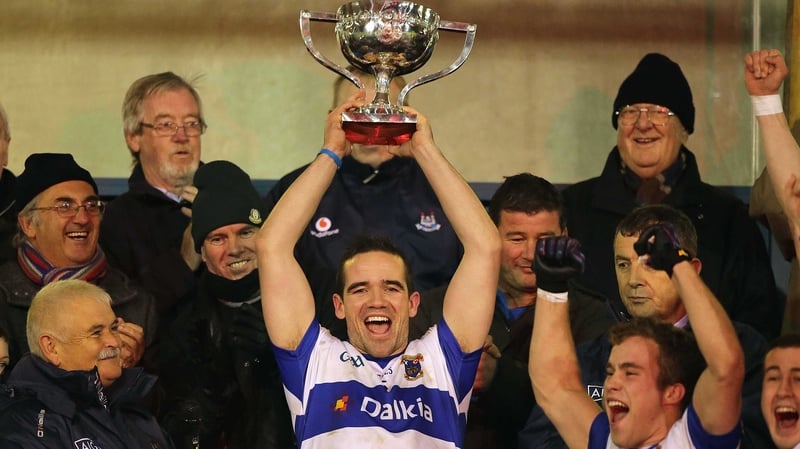 Ger Brennan of St Vincent's lifts the Dublin SFC trophy