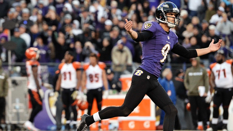 Justin Tucker celebrates after kicking the game-winning field goal against the Cincinnati Bengals