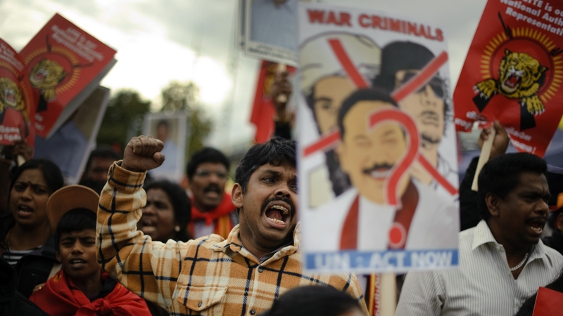 A Tamil activist reacts during a demonstration in 2011 at the UN's European headquarters in Geneva calling for a probe into alleged war crimes committed by Sri Lanka