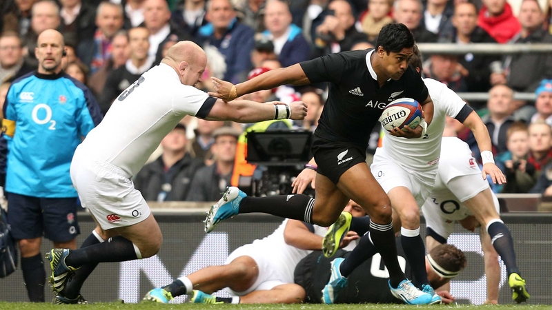 Julian Savea gets past Dan Cole for a first half try