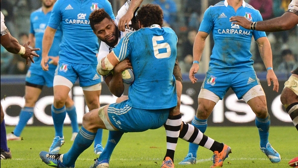 Fiji's Metuisela Talebula is halted by Italy flanker Alessandro Zanni