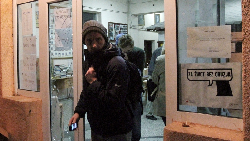 International observers leaving a polling station in Mitrovica attacked by masked men a fortnight ago
