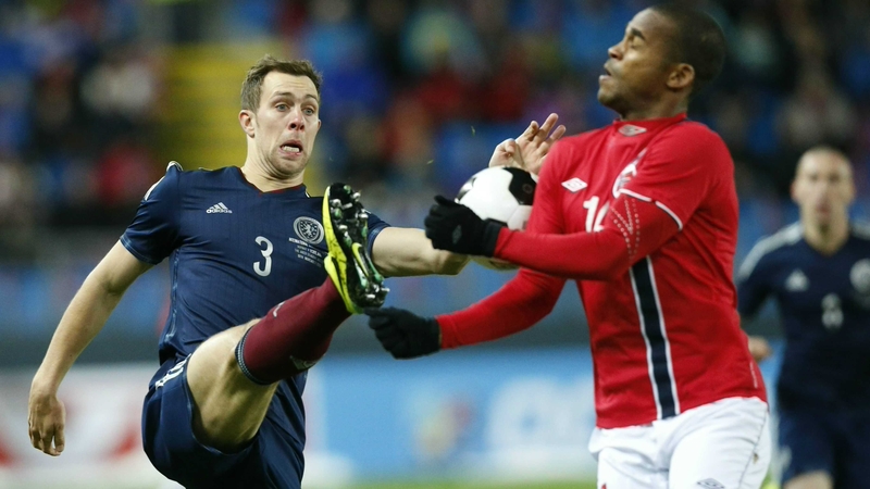 Norway's Ola Kamara and Scotland's Steven Whittaker vie for possession