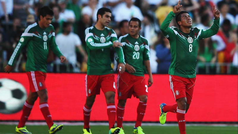 Juan Carlos Medina celebrates Mexico's fourth goal of the match