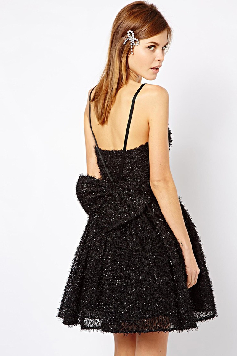 Too adorable for words. You can pick up this French Connection Glitter Whisper Dress with Bow Back on Asos for €242.60
