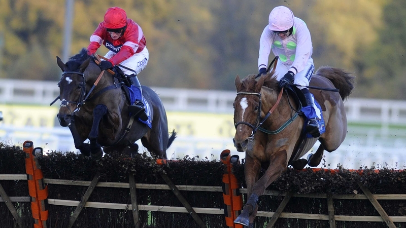 Ruby Walsh riding Annie Power (R) clear the last to win from Zarkandar