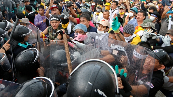 Anti-government protesters confront police