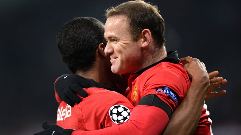 Opening goalscorer Antonio Valencia celebrates with Wayne Rooney