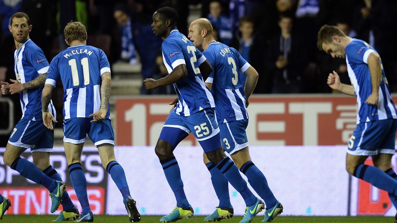 Ireland's James McClean (11) celebrates with goalscorer Leon Barnett (c)