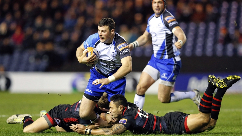 Robbie Henshaw is tackled by Edinburgh's Ben Atiga and Greig Tonks