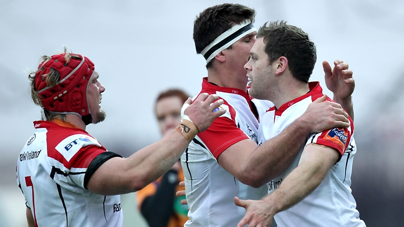Darren Cave (r) celebrates his first-half try with some team-mates