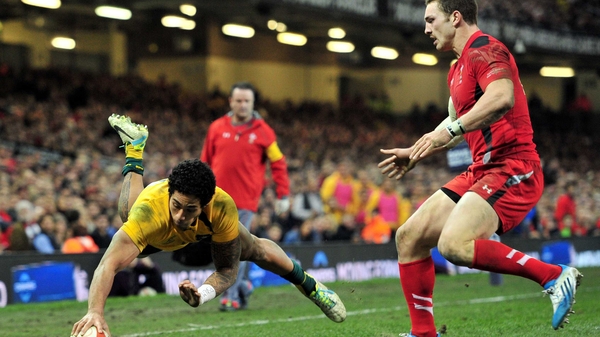 Wallabies wing Joe Tomane dives over to score a vital try