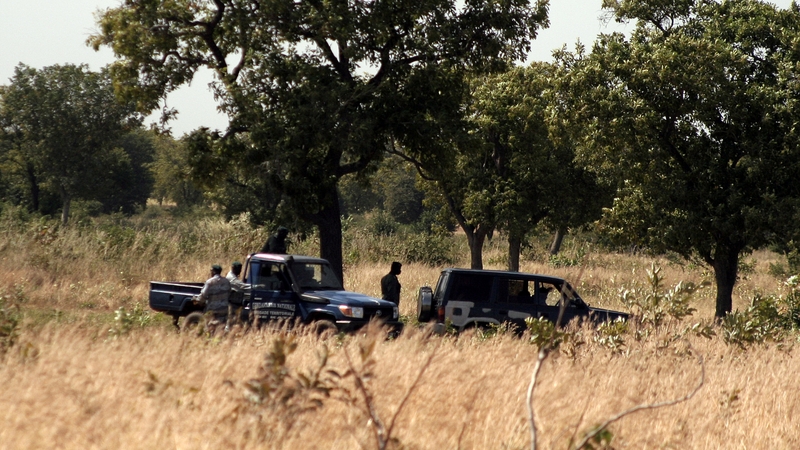 Malian authorities work on the site where 21 bodies have been found