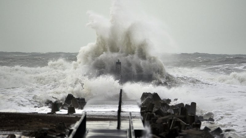 Waves hit the coast of Northern Jutland in Denmark as storms lash Britain and northern Europe