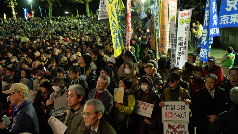Demonstrators rally over Japanese state secrets bill which is aimed at toughening penalties for leaks gathered outside the Japanese parliament