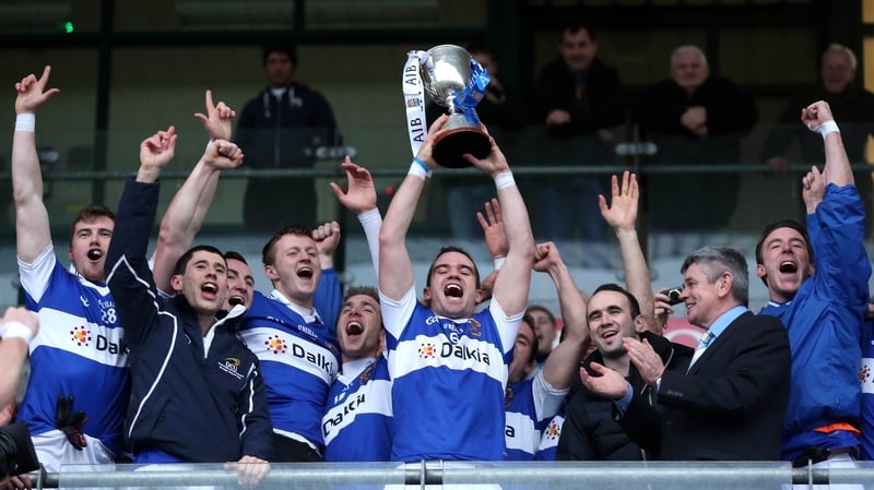St Vincent's captain Ger Brennan lifts the trophy