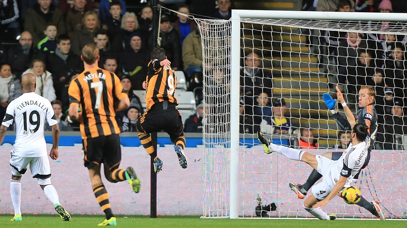 Danny Graham (no. 9) gives Hull the lead