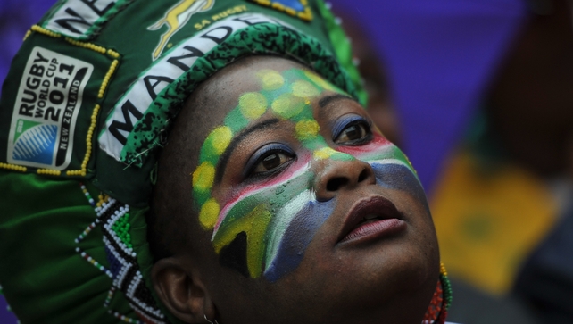 A woman attends the memorial service of former president Mandela
