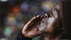 A man sings passionately during the memorial service