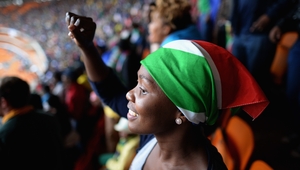 Members of the public sang and danced inside the Soweto Stadium