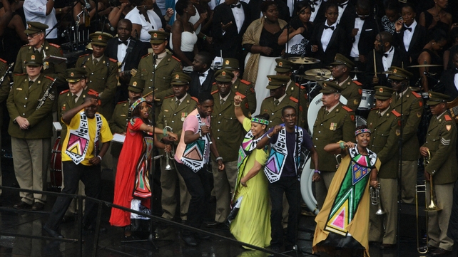 Dancers perform at the service
