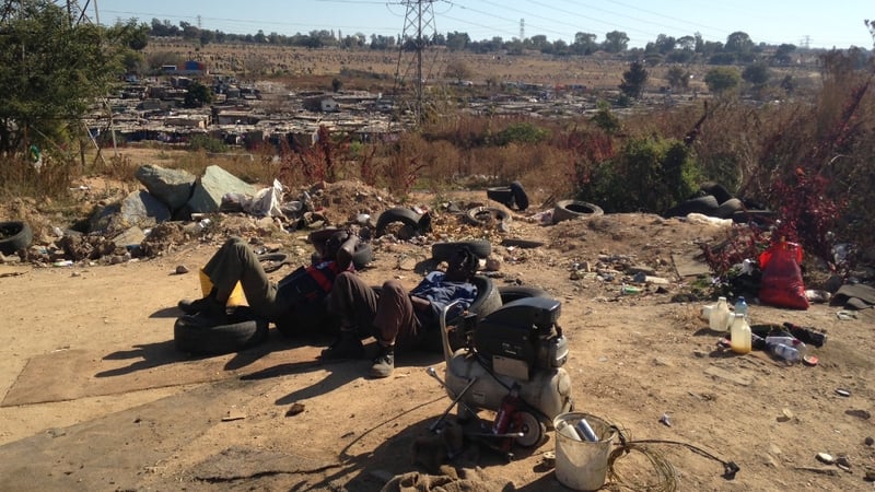 Two tyre sales men at their stall in Alexandra township (Pic: Fran McNulty)