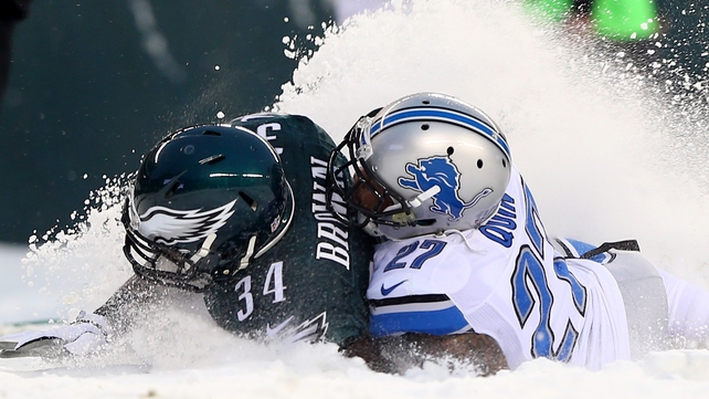 Bryce Brown of the Philadelphia Eagles is tackled by Detroit Lions' Glover Quin