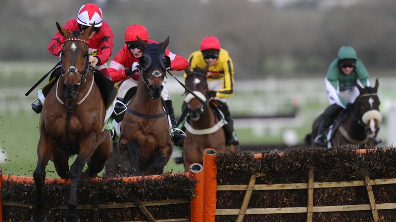 The New One (L) clears the last to win the International Hurdle at Cheltenham