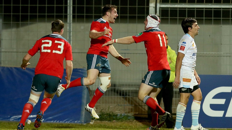 JJ Hanrahan (c) celebrates scoring the winning try for Munster as they pull off another famous win