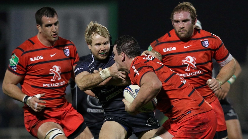 Fionn Carr is tackled by Toulouse's Louis Picamoles