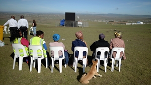 Crowds gathered to watch the ceremony on large screens at the site where Nelson Mandela will be buried