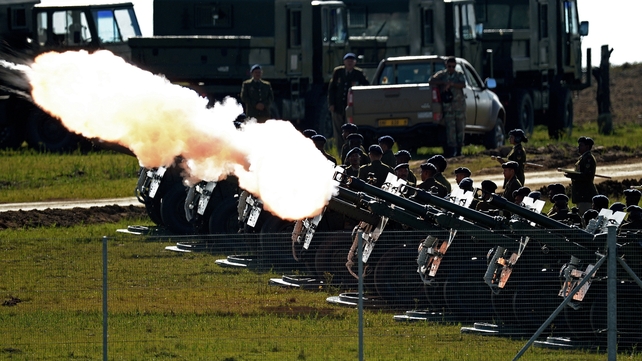 Members of the South African defence forces performing a 21 gun salute