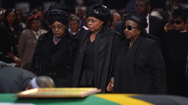 Nelson Mandela's widow Graca Machel and his ex-wife Winnie Mandela Madikizela at the ceremony