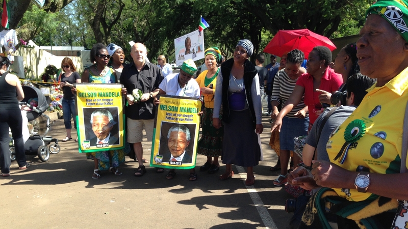 The group of ANC Women's League singing outside Nelson Mandela's home in Johannesburg.