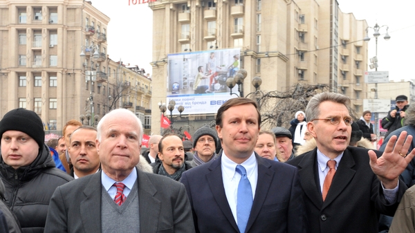 Senator McCain addressed Ukrainians camped on Kiev's main square protesting against Mr Yanukovich's U-turn in trade policy