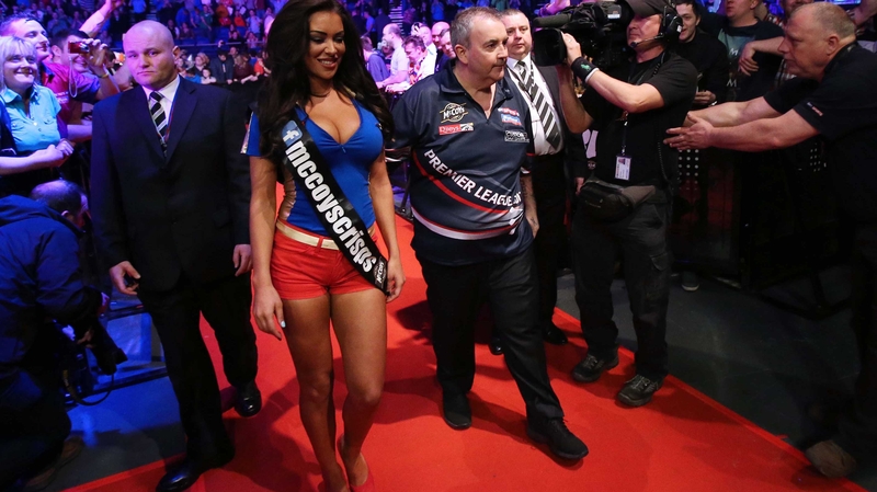 Phil Taylor takes on Raymond van Barneveld in the O2