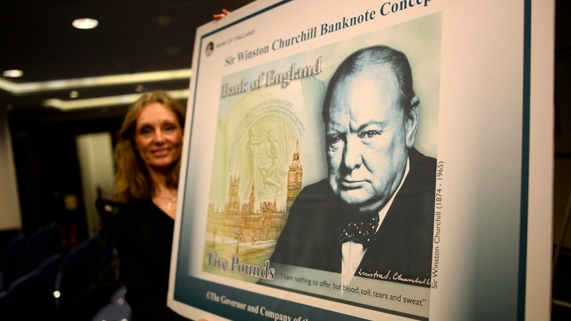 The Bank of England's Victoria Cleland shows off a concept design for a plastic £5 banknote