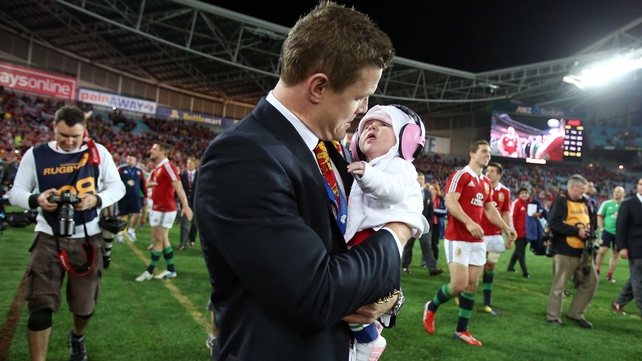 Brian O'Driscoll and daughter Sadie celebrate the Lions' series victory over Australia in July