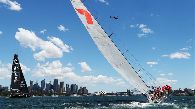 Wild Oates XI follows Perpetual Loyal on the first lap during the 2013 SOLAS Big Boat Challenge at Sydney Harbour