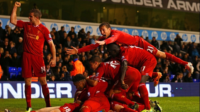 Liverpool's Jon Flanagan is mobbed after his goal against Tottenham at White Hart Lane