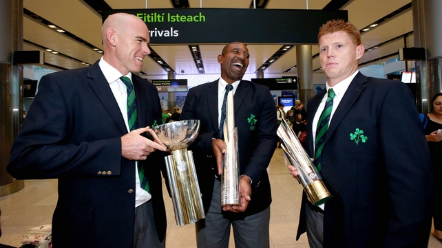 Trent Johnston, Phil Simmons and Kevin O'Brien arrive in Dublin airport with the three international cricket trophies Ireland won this year